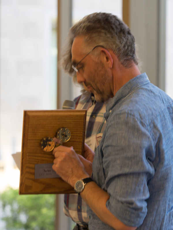 An awardee playing with the device
